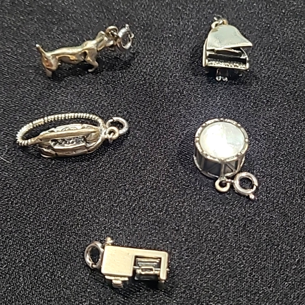 Lot of sterling by jewel art charms